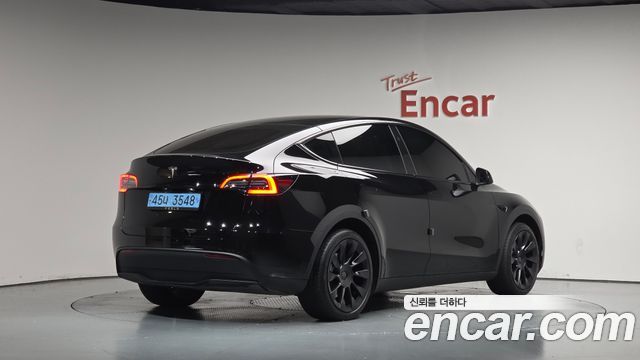 Tesla Model Y RWD 2024 — фото 2