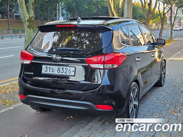 Kia Carens 1.7 VGT Noblesse 2014 — фото 7