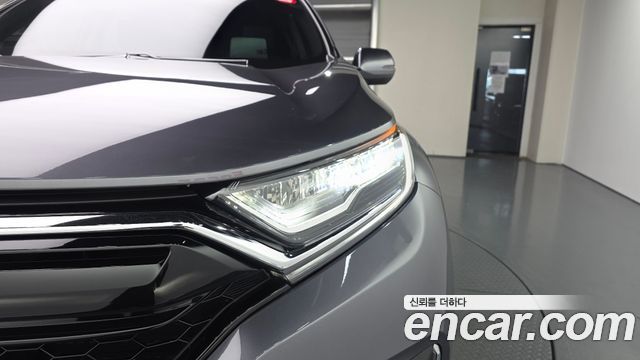Honda CR-V (V) 2.0 Hybrid Touring 4WD 2022 — фото 22