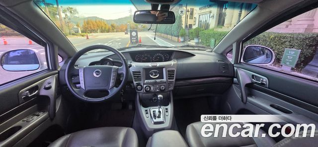 KG Mobility (SsangYong) Korando Turismo 4WD GT 11-seater 2014 — фото 7