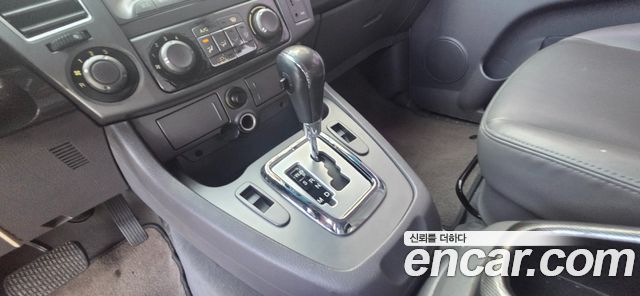 KG Mobility (SsangYong) Korando Turismo 4WD GT 11-seater 2014 — фото 9