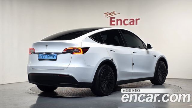 Tesla Model Y RWD 2024 — фото 2