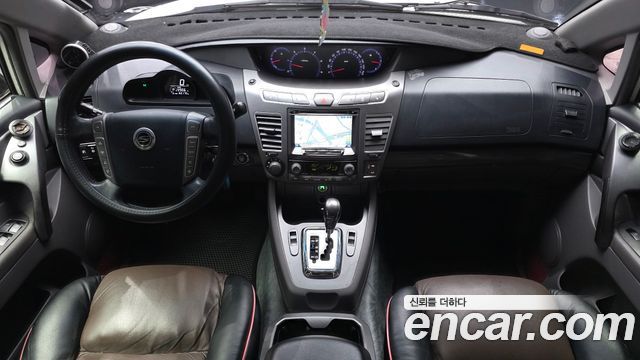 KG Mobility (SsangYong) Korando Turismo 4WD GT 11-seater 2014 — фото 7