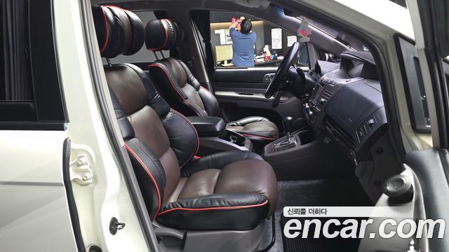 KG Mobility (SsangYong) Korando Turismo 4WD GT 11-seater 2014 — фото 11