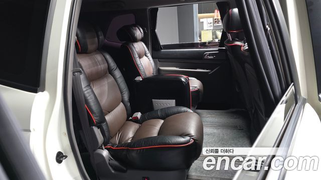 KG Mobility (SsangYong) Korando Turismo 4WD GT 11-seater 2014 — фото 12