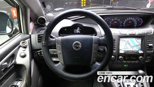 KG Mobility (SsangYong) Korando Turismo 4WD GT 11-seater 2014 — фото 13