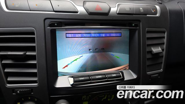 KG Mobility (SsangYong) Korando Turismo 4WD GT 11-seater 2014 — фото 15