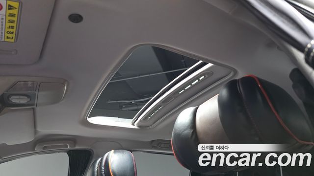 KG Mobility (SsangYong) Korando Turismo 4WD GT 11-seater 2014 — фото 16