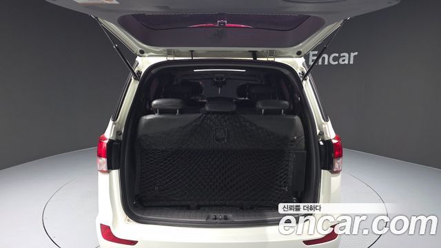 KG Mobility (SsangYong) Korando Turismo 4WD GT 11-seater 2014 — фото 20