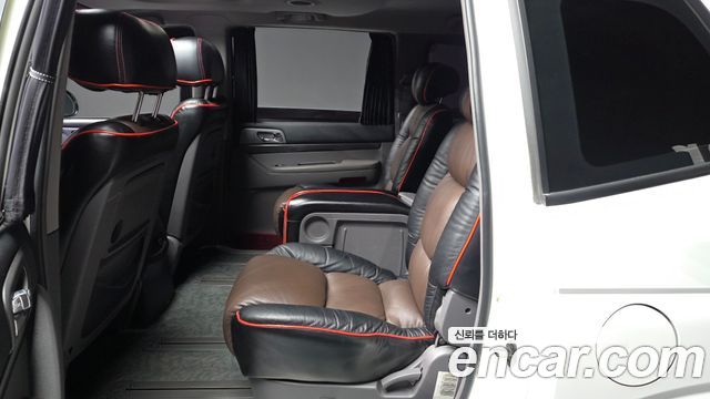 KG Mobility (SsangYong) Korando Turismo 4WD GT 11-seater 2014 — фото 26