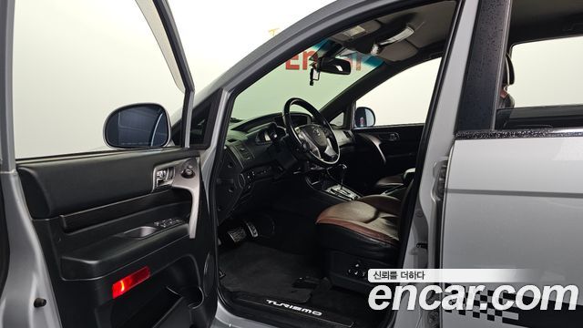 KG Mobility (SsangYong) Korando Turismo 4WD TX 9-seater 2017 — фото 10