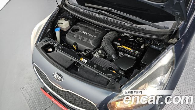 Kia Carens 1.7 VGT Prestige 2014 — фото 6