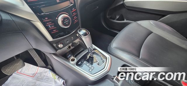 KG Mobility (SsangYong) Tivoli VX 2WD 2015 — фото 9