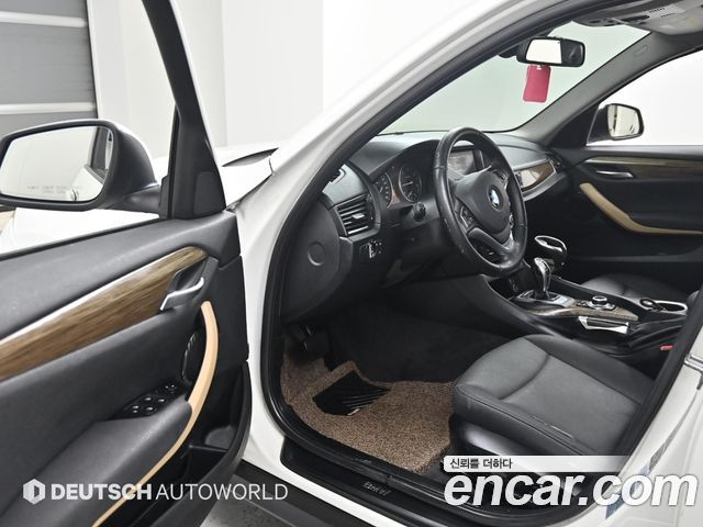 BMW X1 (E84) xDrive 18d 2015 — фото 15