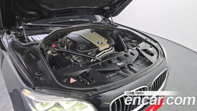 BMW 7 Series (F01) 750Ld xDrive Individual 2015 — фото 6