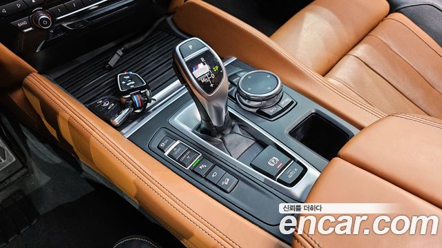 BMW X6 (F16) M50d 2015 — фото 9