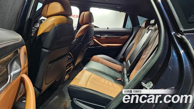 BMW X6 (F16) M50d 2015 — фото 11