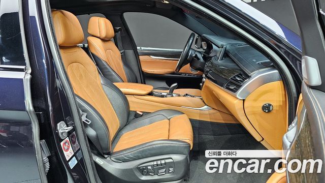 BMW X6 (F16) M50d 2015 — фото 12