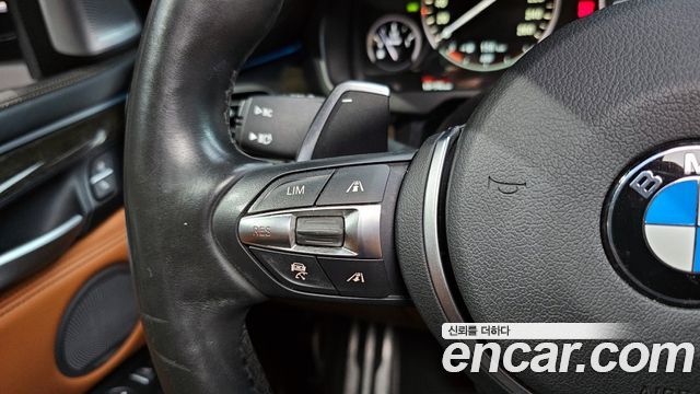 BMW X6 (F16) M50d 2015 — фото 16