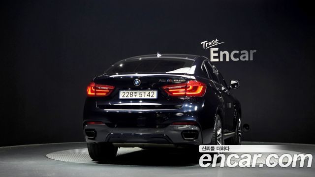 BMW X6 (F16) M50d 2015 — фото 4