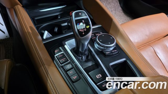 BMW X6 (F16) M50d 2015 — фото 9