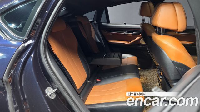 BMW X6 (F16) M50d 2015 — фото 16