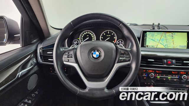 BMW X6 (F16) xDrive 30d 2015 — фото 13