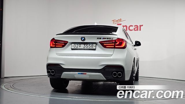 BMW X6 (F16) M50d 2018 — фото 4