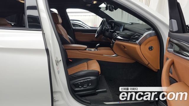 BMW X6 (F16) M50d 2018 — фото 11