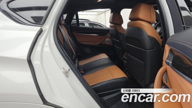 BMW X6 (F16) M50d 2018 — фото 12