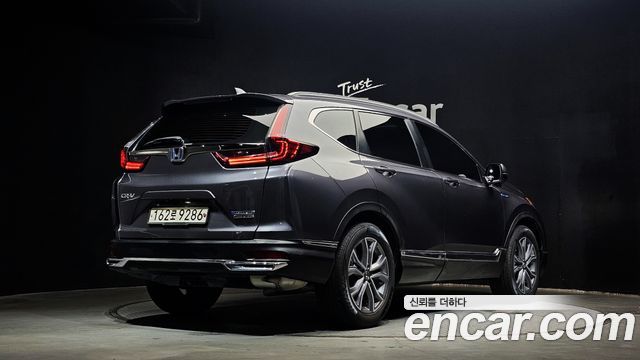 Honda CR-V (V) 2.0 Hybrid Touring 4WD 2022 — фото 2