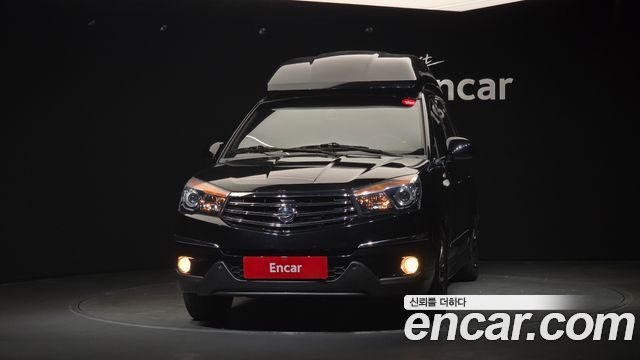 KG Mobility (SsangYong) Korando Turismo 4WD Chateau 11-seater 2014 — фото 3