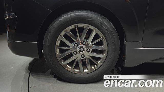 KG Mobility (SsangYong) Korando Turismo 4WD Chateau 11-seater 2014 — фото 5
