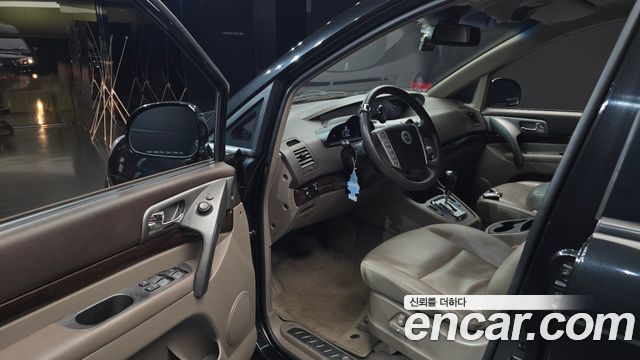 KG Mobility (SsangYong) Korando Turismo 4WD Chateau 11-seater 2014 — фото 10