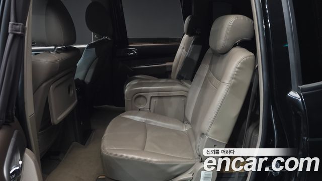 KG Mobility (SsangYong) Korando Turismo 4WD Chateau 11-seater 2014 — фото 12