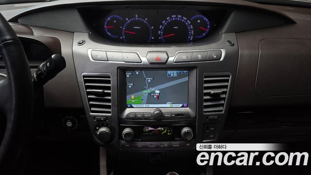 KG Mobility (SsangYong) Korando Turismo 4WD Chateau 11-seater 2014 — фото 14