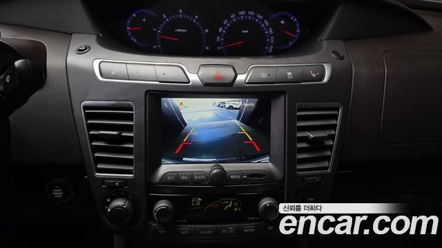 KG Mobility (SsangYong) Korando Turismo 4WD Chateau 11-seater 2014 — фото 15