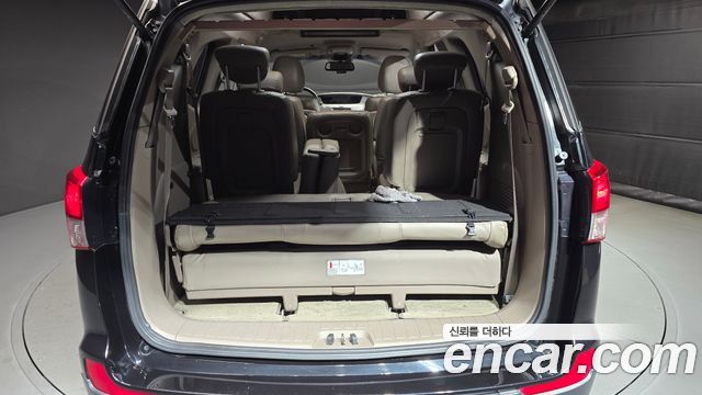 KG Mobility (SsangYong) Korando Turismo 4WD Chateau 11-seater 2014 — фото 20