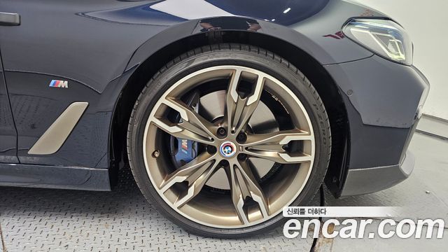 BMW 5 Series (G30) M550i xDrive 2021 — фото 21