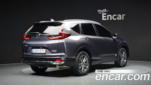 Honda CR-V (V) 2.0 Hybrid Touring 4WD 2021 — фото 2