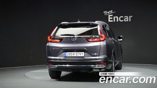 Honda CR-V (V) 2.0 Hybrid Touring 4WD 2021 — фото 4