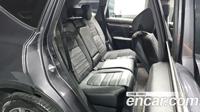 Honda CR-V (V) 2.0 Hybrid Touring 4WD 2021 — фото 11
