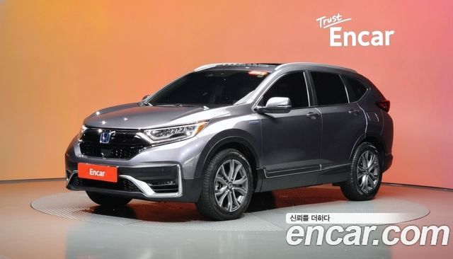 Honda CR-V (V) 2.0 Hybrid Touring 4WD 2021 — фото 1