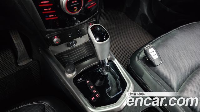 KG Mobility (SsangYong) Tivoli VX 2WD 2015 — фото 9