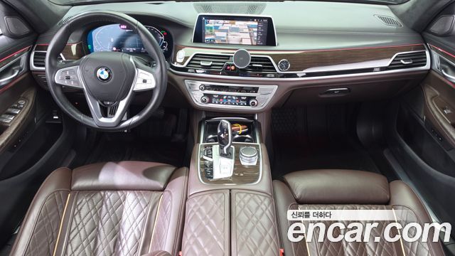 BMW 7 Series (G11) 745e iPerformance Design Pure Excellence 2020 — фото 7