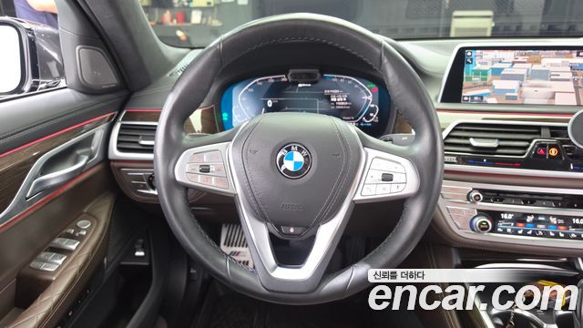 BMW 7 Series (G11) 745e iPerformance Design Pure Excellence 2020 — фото 13