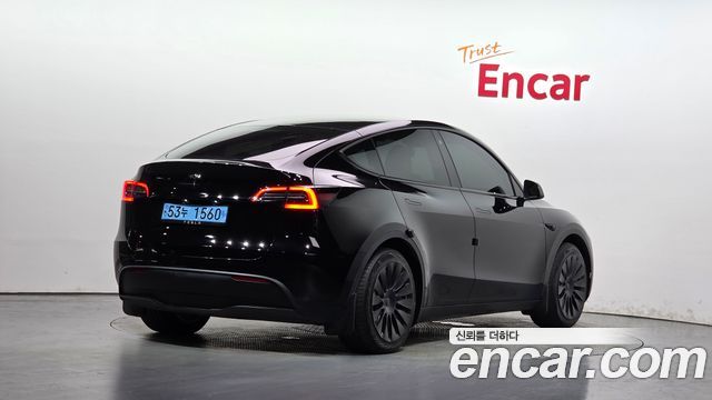 Tesla Model Y RWD 2024 — фото 2