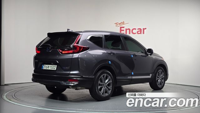 Honda CR-V (V) 2.0 Hybrid Touring 4WD 2022 — фото 2