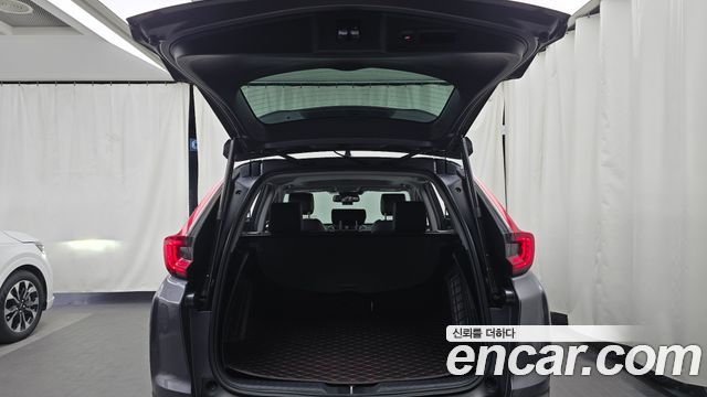 Honda CR-V (V) 2.0 Hybrid Touring 4WD 2022 — фото 19