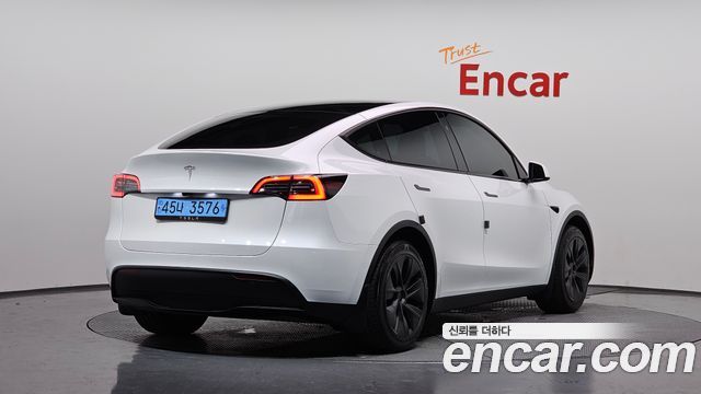 Tesla Model Y RWD 2024 — фото 2